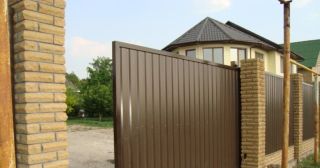 Купить откатные ворота из профнастила Прокопьевск, цена от 1782 руб.